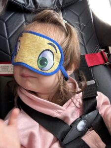 Playing around with the kids' mask on the plane